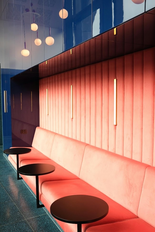 Coral wall banquette by All Upholstery